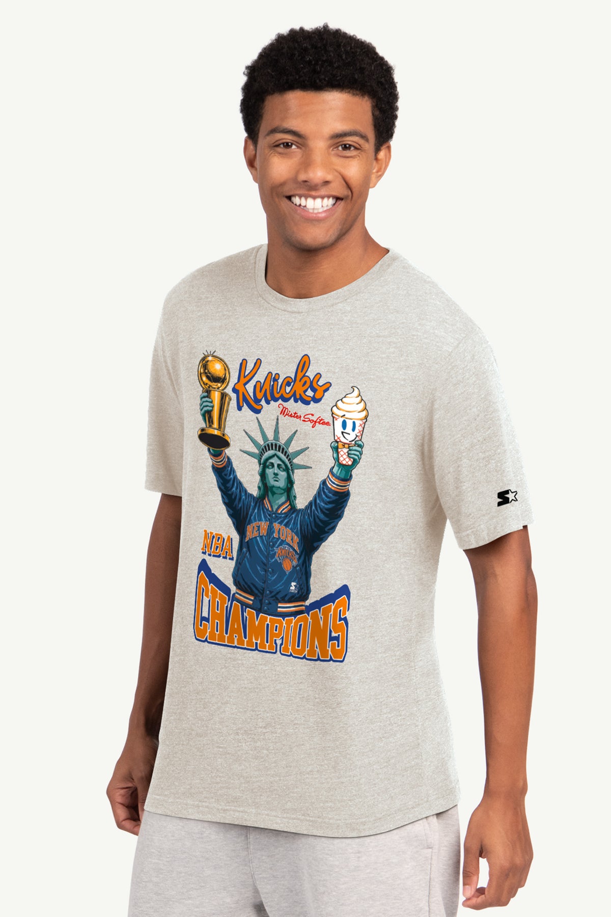 MENS NEW YORK KNICKS MISTER SOFTEE 2026 NBA CHAMPIONS T SHIRT View 1 MENS NEW YORK KNICKS MISTER SOFTEE 2026 NBA CHAMPIONS T SHIRT View 1